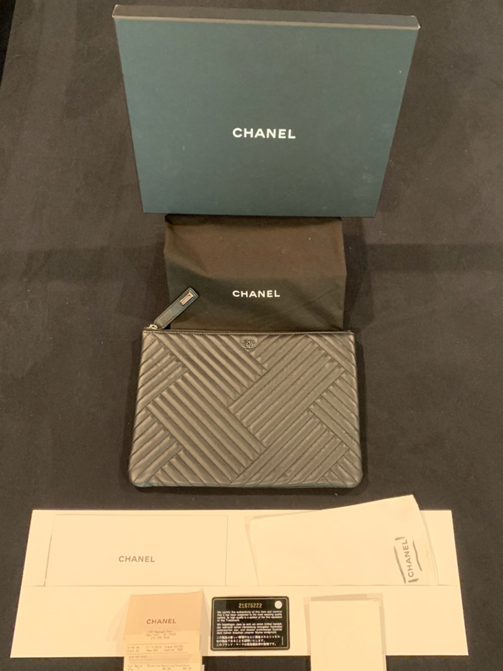 CHANEL Black Chevron O Case Medium Zip Pouch
